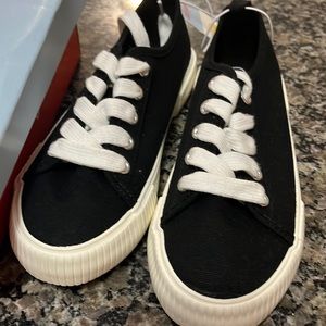 Kids size 1 sneakers. Bought wrong size. Never worn